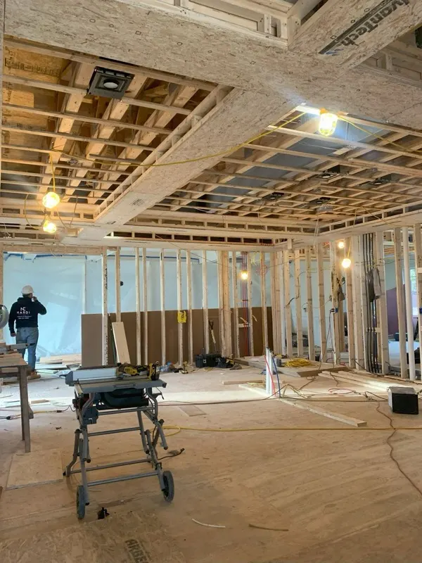 Nardi Electric technician working on a room framing rough-in