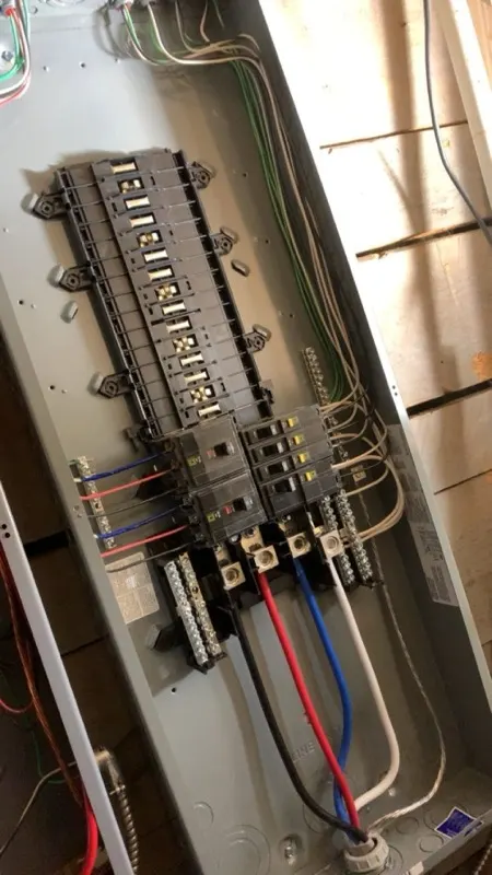 Close-up of a fully wired residential breaker panel