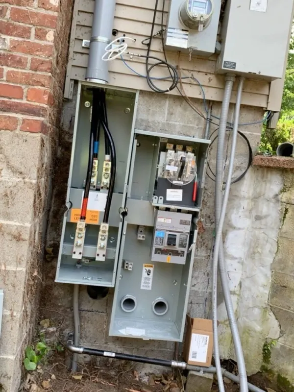 Exterior commercial electrical service panel and meter